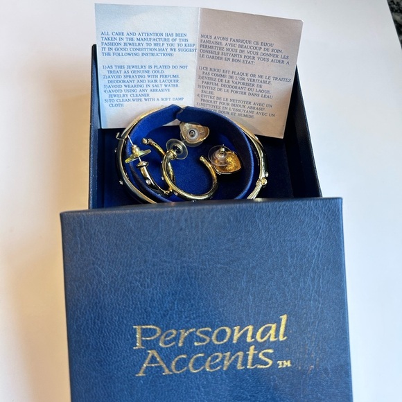 Vintage early 90s Gold tone hoop earrings, studs, and bangle bracelet set. - Picture 6 of 6